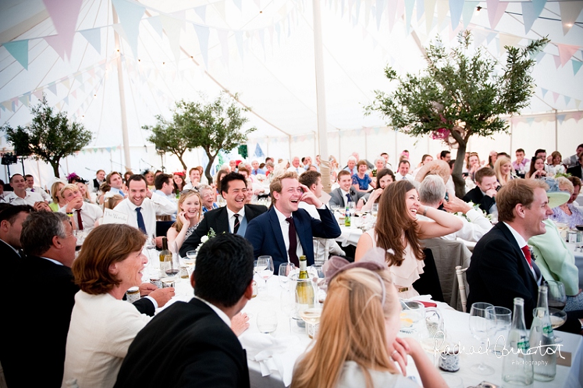 Professional photograph of wedding bunting outside wedding marquee