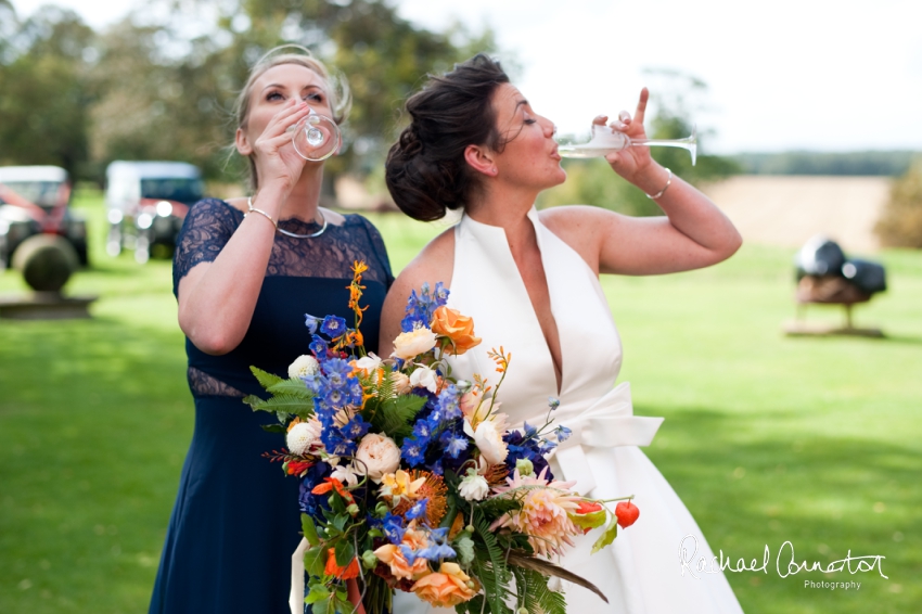 Professional colour photograph of Sophie and Richard's Summer wedding at Langar Hall by Rachael Connerton Photography