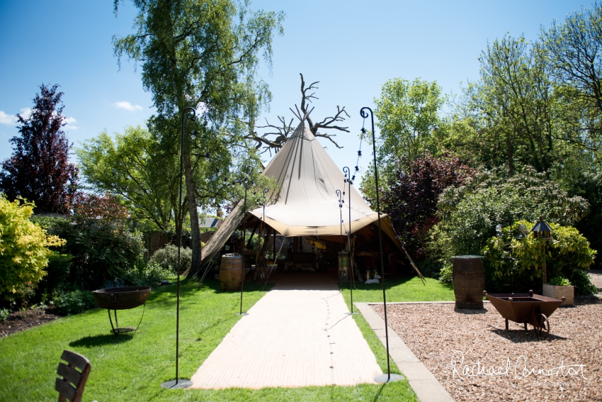 Professional colour photograph of Steph and Hugh's Spring tipi wedding by Rachael Connerton Photography