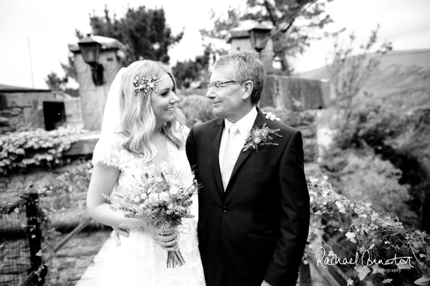 Professional colour photograph of Holly and Chris' Cornwall beach wedding at Palhawn Fort by Rachael Connerton Photography