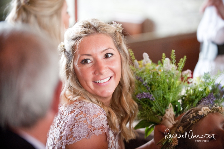 Professional colour photograph of Holly and Chris' Cornwall beach wedding at Palhawn Fort by Rachael Connerton Photography