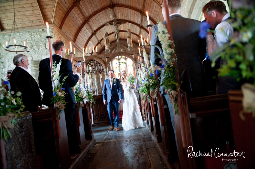 Professional colour photograph of Holly and Chris' Cornwall beach wedding at Palhawn Fort by Rachael Connerton Photography