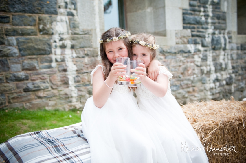 Professional colour photograph of Holly and Chris' Cornwall beach wedding at Palhawn Fort by Rachael Connerton Photography