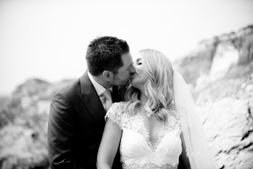 Professional colour photograph of Holly and Chris' Cornwall beach wedding at Palhawn Fort by Rachael Connerton Photography