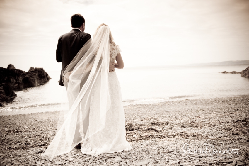 Professional colour photograph of Holly and Chris' Cornwall beach wedding at Palhawn Fort by Rachael Connerton Photography