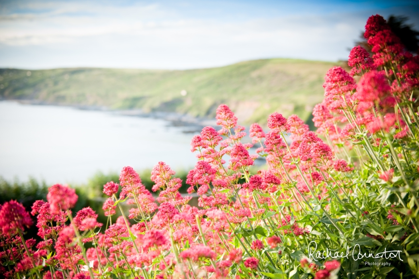 Professional colour photograph of Holly and Chris' Cornwall beach wedding at Palhawn Fort by Rachael Connerton Photography