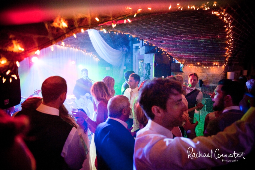 Professional colour photograph of Holly and Chris' Cornwall beach wedding at Palhawn Fort by Rachael Connerton Photography