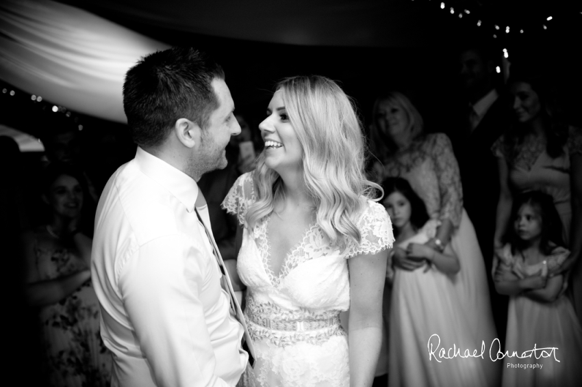 Professional colour photograph of Holly and Chris' Cornwall beach wedding at Palhawn Fort by Rachael Connerton Photography